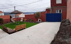 Casa María con jardín, aparcamiento y vistas al mar